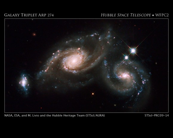 Arp 274 is a trio of galaxies. They appear to be partially overlapping in this image, but may be located at different distances. Credit: NASA, ESA, M. Livio and the Hubble Heritage Team (STScI/AURA)