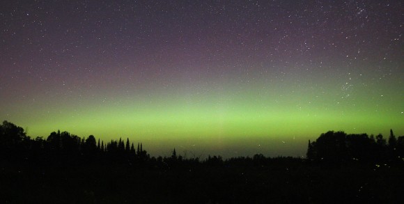 A thick green arc of aurora settled in for the night last night. It was about 5 degrees thick and some 10 degrees high. A faint but colorful diffuse aurora glowed above it. All photos taken with a 16-35 mm lens at f/2.8 and 30-second time exposure. Credit: Bob King