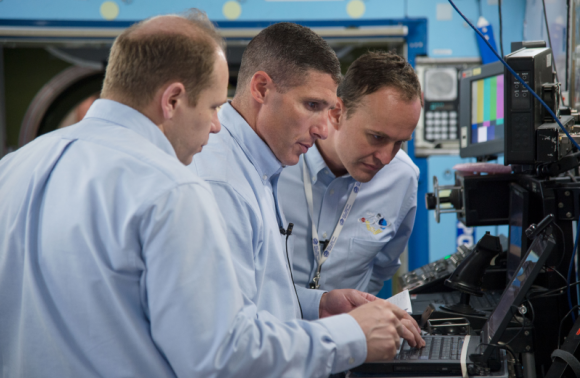 Russian cosmonaut Oleg Kotov (left), Expedition 37 flight engineer and Expedition 38 commander; along with NASA astronaut Michael Hopkins (center) and Russian cosmonaut Sergey Ryazanskiy, both Expedition 37/38 flight engineers. Credit: NASA