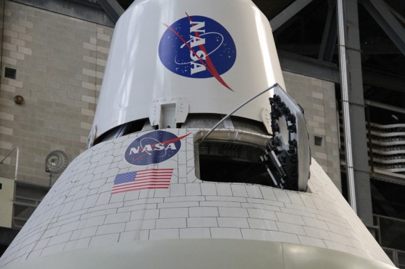 Astronaut hatch swung open on Orion capsule mock up joined to base of Launch Abort System (LAS) emergency escape tower. Credit: Ken Kremer/kenkremer.com