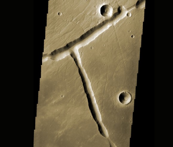 Tectonic stretching of the Martian crust created this unusual right-angle fracture. I wonder how many other letters of the alphabet we might find on the Red Planet?
