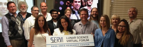Members and student involved with the former NASA Lunar Science Institute pose with a sign designating the Institute's new name, the Solar System Exploration and Research Virtual Institute. Credit: SSERVI. 