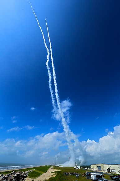 Exhaust trails from Black Brant V and a Terrier-Improved Orion launched in support of Daytime Dynamo mission on July 4, 2013. Credit: NASA P. Black