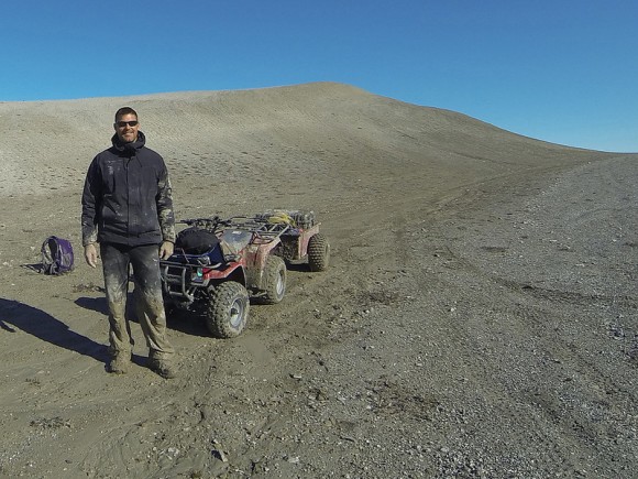Canadian astronaut Jeremy Hansen after rescuing a rover out of the mud in the Arctic's Haughton Crater. Hansen was participating in a geology expedition in July 2013. Credit: Jeremy Hansen/Twitter