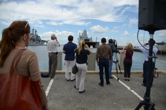 Social media and media including Ken observe the Aug. 15 Orion water recovery test from the pier at Naval Station Norfolk, VA. Credit: NASA