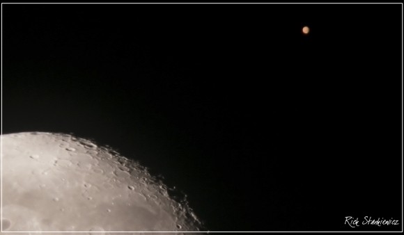 Mars as seen during a close conjunction with the Moon on July 17th, 2003. Mars was 20 arc seconds in size at the time leading up to the August 2003 opposition.