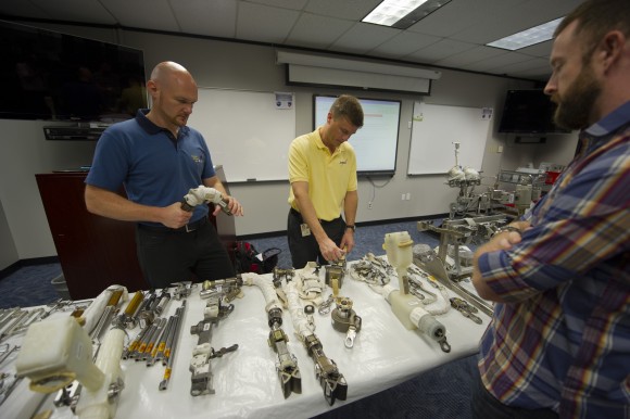 ESA astronaut Alexander Gerst (left) and NASA astronaut Gregory Reid Wiseman (middle) during training at NASA's Johnson Space Center. Credit: ESA–S. Corvaja