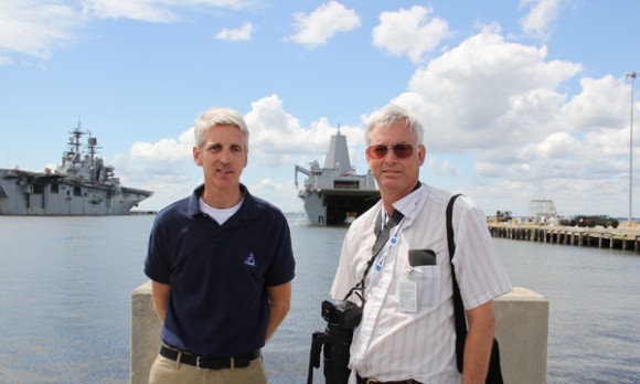 Scott Wilson, NASA’s Orion production manager and Ken Kremer, Universe Today discuss the Aug. 15 recovery test back dropped by Orion and the USS Arlington. Credit: Ken Kremer/kenkremer.com