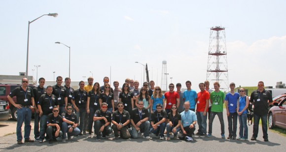 More than 40 University students participating in the Aug. 13 RockSat-X science payload pose for photo op with the Terrier-Improved Malemute sounding rocket that will launch their own experiments to space from NASA Wallops Flight Facility, VA. Credit: Ken Kremer/kenkremer.com
