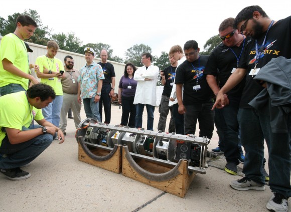 Rocket science university students get ready to tear apart the RockSat-X science payload after recovery from Atlantic Ocean splashdown following Aug. 13 rocket blastoff from NASA Wallops Flight Facility, VA. Credit: Ken Kremer/kenkremer.com