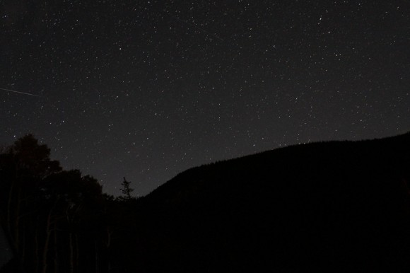 Perseid meteor seen over the Rocky Mountains of Colorado, taken with a Canon 7D 18-55mm. Credit and copyright: Micah Holtgraves.
