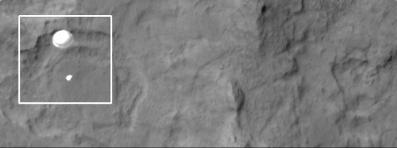 The HiRISE Camera on the Mars Reconnaissance Orbiter captured the Curiosity rover descending on its parachute to land on Mars. Credit: NASA/JPL/Arizona State University.