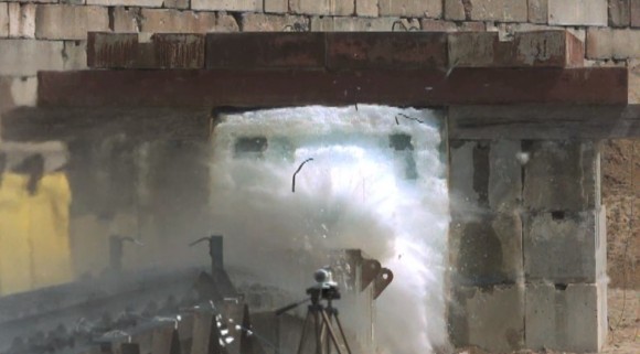 A subsurface spacecraft prototype is deliberately slammed into 10 tonnes of ice in a rocket facility. Credit: European Space Agency/YouTube (screenshot)
