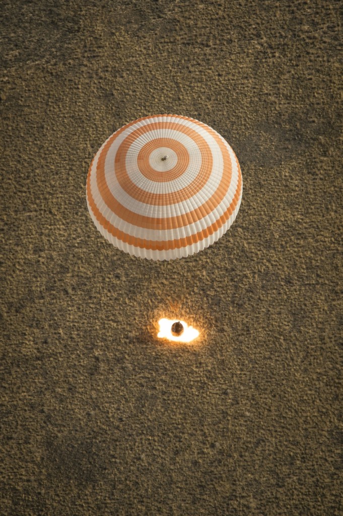 The Soyuz TMA-08M spacecraft with Expedition 36 lands in a remote area near the town of Zhezkazgan, Kazakhstan, on Wednesday, Sept. 11, 2013. Credit: NASA/Bill Ingalls. 