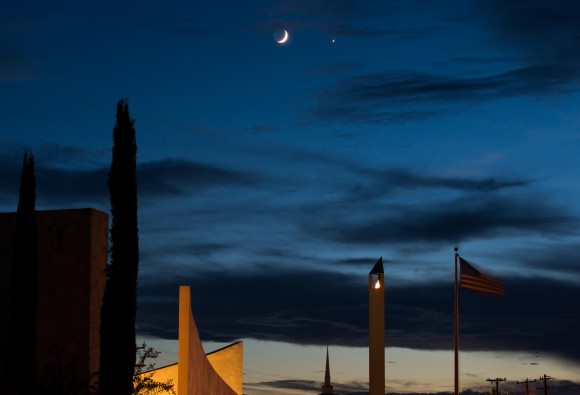 Moon and Venus conjunction over the Eternal Flame of the 9/11 Memorial located here in San Antonio, Texas. Credit and copyright: Adrian New.