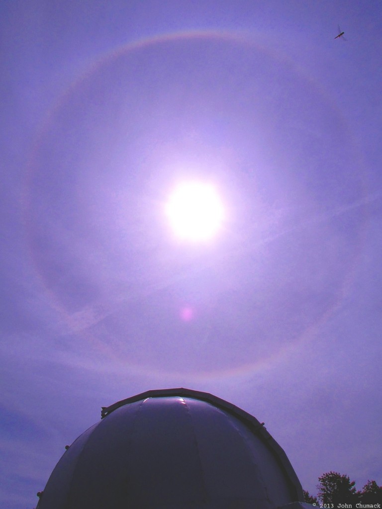 A full solar halo -- plus a dragonfly -- seen above John Chumack's observatory dome on September 15, 2013. Credit and copyright: John Chumack/Galactic Images. 