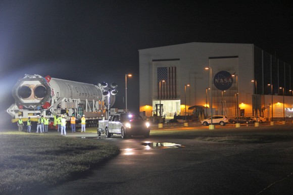 Antares rocket begins rollout atop transporter erector to Launch Pad 0A at NASA Wallops Island Facility, VA., on Sept. 13, 2013. Credit: Ken Kremer (kenkremer.com)