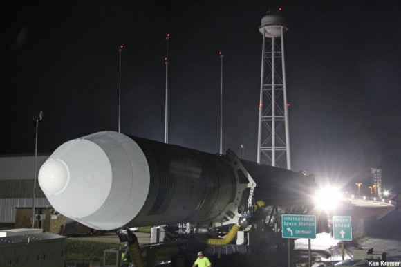 Antares rocket arrives at on ramp to launch pad with cool new signs directing traffic to launch pads for trips to the Moon and the International Space Station. Credit: Ken Kremer (kenkremer.com)