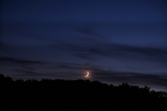 The new Moon with Venus on its right. Taken from the dark sky preserve at the Nutwood Observatory in central Ontario, Cananda. Credit and copyright: Brian McGaffney.
