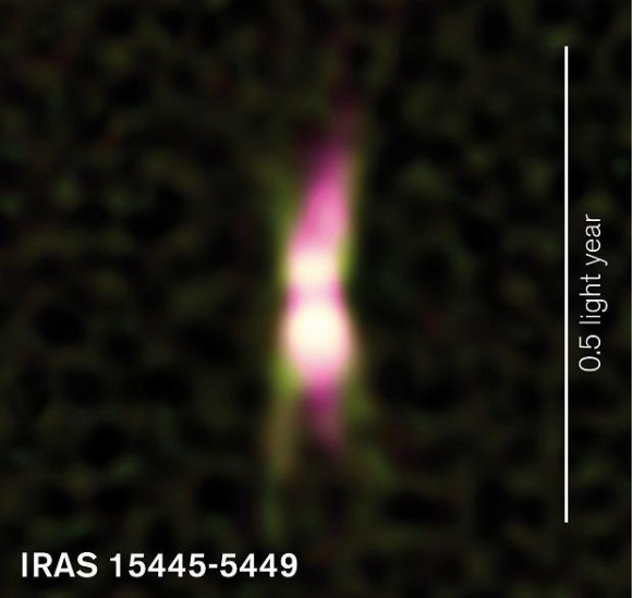 A jet of energetic particles (shown in magenta) is shaping the environment around the star IRAS 15445-5449. Infrared light from dusty material which the jet has already shaped into a symmetric form is shown in green. The star itself is hidden by dust in its environment. Credit: E. Lagadec/ESO/A. Pérez Sánchez)