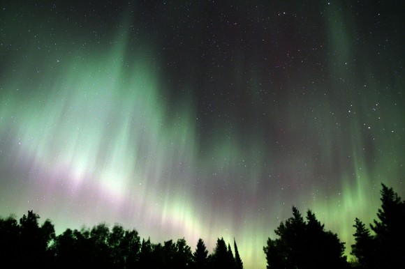 Finally - a mighty show of rays around 3 a.m. this morning. What you don't see in the photo are the rhythmic pulsations fluttering through the entire display, a phenomenon known as "flaming". Credit: Bob King