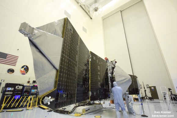Magnetometer science instrument boom juts out from MAVEN solar panel during launch processing inside the clean room at the Kennedy Space Center. Credit: Ken Kremer/kenkremer.com