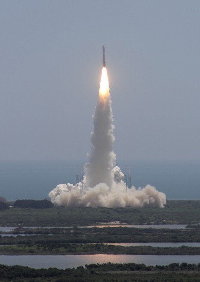 Juno soars skyward to Jupiter on Aug. 5, 2013 from launch pad 41 at Cape Canaveral Air Force Station at 12:25 p.m. EDT. View from the VAB roof. Credit: Ken Kremer/kenkremer.com