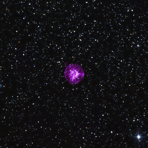 SNR B0049-73.6 in X-ray and infrared light. Chandra's observations (purple) revealed that the explosion seen here was likely from a star's central core collapse. Infrared data from the 2MASS survey is also visible in red, green and blue. Credit: X-ray: NASA/CXC/Drew Univ/S.Hendrick et al, Infrared: 2MASS/UMass/IPAC-Caltech/NASA/NSF