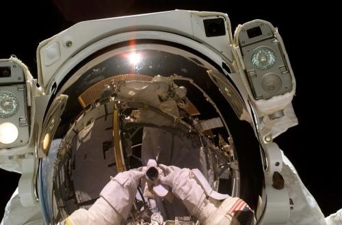 NASA astronaut Joe Tanner grabs a helmet shot during a spacewalk on STS-115 in September 2006. Credit: NASA