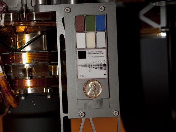 Curiosity’s calibration target, shown before launch. Two instruments at the end of the robotic arm on NASA's Mars rover Curiosity use the calibration targets attached to a shoulder joint of the arm. Credit: NASA/JPL-Caltech