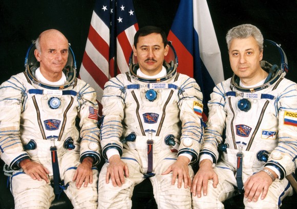 Crew of Soyuz TM-32, which flew to the International Space Station in 2001. From left, space tourist Dennis Tito, Russian cosmonaut Talgat Musabayev, and Russian cosmonaut Yuri Baturin. Credit: Wikipedia/NASA