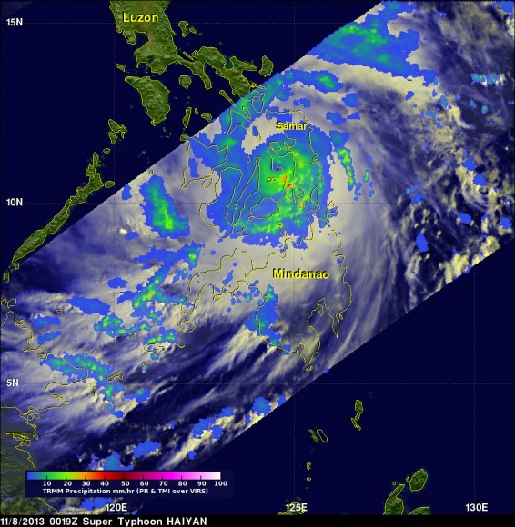 NASA's TRMM satellite data on Nov. 8 at 00:19 UTC showed Haiyan had a well-defined eye surrounded by a symmetric area of moderate rain (green ring with a blue center) with several rainbands wrapping in from the south (green arcs) while crossing the island of Leyte in the central Philippines. Credit: NASA/SSAI, Hal Pierce