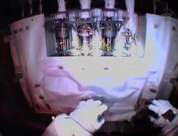 This broken ammonia pump is visible through the helmet camera of NASA astronaut Rick Mastracchio, who performed a spacewalk Dec. 21 to begin replacing the tank along with Mike Hopkins. Credit: NASA