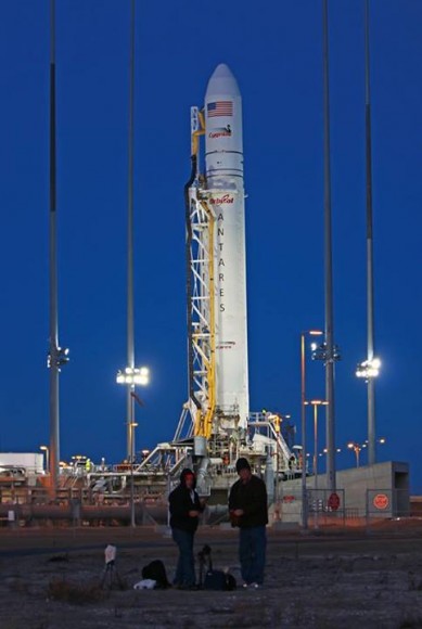 Just a GORGEOUS view of Antares at Wallops pad 0A this evening. Space journalists Ken Kremer /Universe Today (right) and Mike Killian (left) setting remote cameras at Antares launch pad amidst bone chilling cold. Credit: Alan Walters/awaltersphoto.com