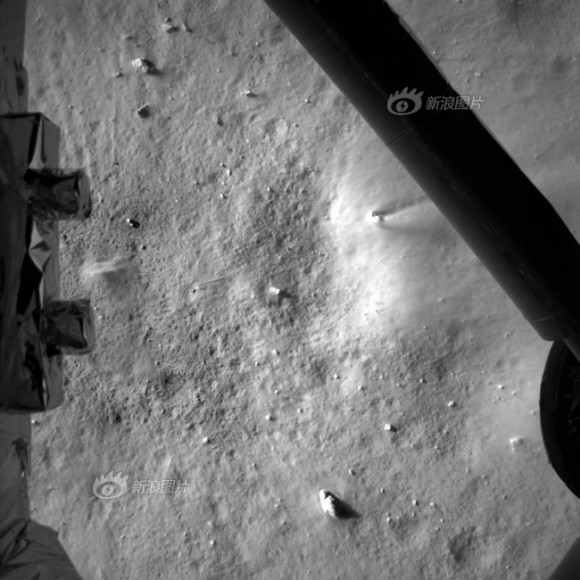 Photo taken by the descent imaging camera on Dec. 14, 2013 shows lunar landscape during Chang'e-3 lunar probe's landing at an altitude of 7.9 kilometers. Credit: Chinese Academy of Sciences