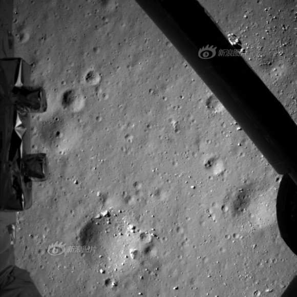 Photo taken by the descent imaging camera on Dec. 14, 2013 shows lunar landscape during Chang'e-3 lunar probe's landing at an altitude of 99 meters. Credit: Chinese Academy of Sciences