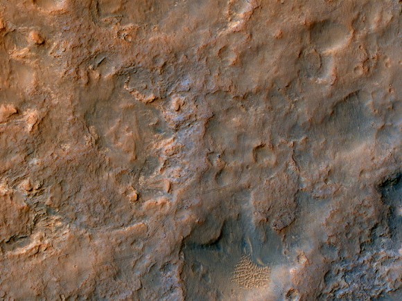 Tracks from the Curiosity rover are visible from orbit to the HiRISE camera on the Mars Reconnaissance Orbiter, taken on Dec. 11, 2013. Credit: NASA/JPL/University of Arizona.