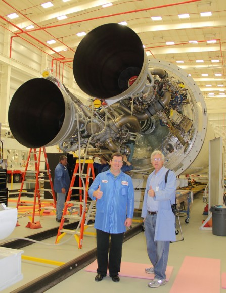 Mike Whalen of Orbital Sciences and Ken Kremer of Universe Today pose at the base of the Antares rocket 1st stage now slated for liftoff on Jan. 7, 2014 at NASA Wallops, Virginia.  Credit: Ken Kremer - kenkremer.com