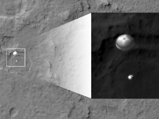 NASA's Curiosity rover heads for a successful landing Aug. 6 under its parachute. Picture snapped by NASA's Mars Reconnaissance Orbiter's High-Resolution Imaging Science Experiment (HiRISE). Credit: NASA/JPL-Caltech/Univ. of Arizona
