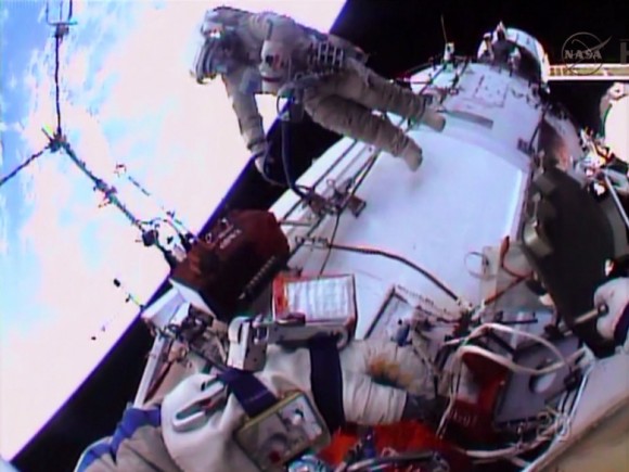 Expedition 38 cosmonaut Oleg Kotov during a January 2014 spacewalk, outside the Zvezda service module. Credit: NASA TV