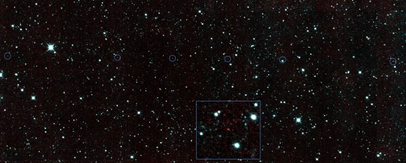 Dots (circled) in this image show the first asteroid spotted by NASA's Near-Earth Object Wide-field Infrared Survey Explorer (NEOWISE) after the mission came out of hibernation. Credit: NASA
