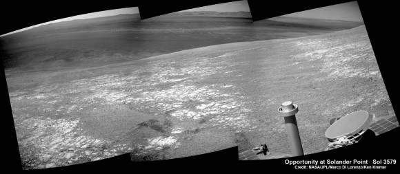 NASA’s Opportunity rover was imaged here from Mars orbit by MRO HiRISE camera on Feb. 14, 2014. This mosaic shows Opportunity’s view today while looking back to vast Endeavour crater from atop Murray Ridge by summit of Solander Point. Opportunity captured this photomosaic view on Feb. 16, 2014 (Sol 3579) from the western rim of Endeavour Crater where she is investigating outcrops of potential clay minerals formed in liquid water. Assembled from Sol 3579 navcam raw images. Credit: NASA/JPL/Cornell/Marco Di Lorenzo/Ken Kremer-kenkremer.com