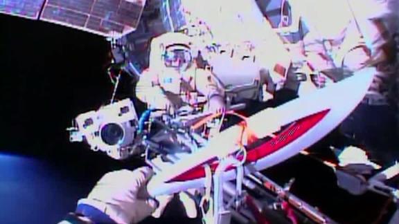 The Olympic torch in orbit during an EVA on Nov. 9, 2013