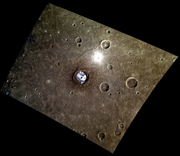 On Mercury, the crater Kertesz pops out in this color-enhanced image taken with NASA's MESSENGER spacecraft. The white you see is shallow irregular depressions, or hollows. Credit: NASA/Johns Hopkins University Applied Physics Laboratory/Carnegie Institution of Washington