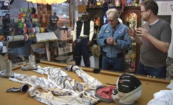 Mythbusters' Adam Savage (left) in front of a replica Mercury spacesuit. Credit: Tested/YouTube (screenshot)