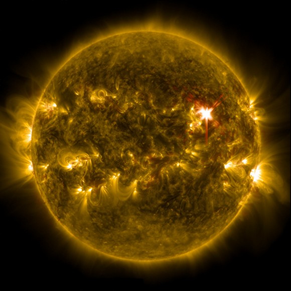 Extreme ultraviolet light streams out of an X-class solar flare as seen in this image captured on March 29, 2014, by NASA's Solar Dynamics Observatory. This image blends two wavelengths of light: 304 and 171 Angstroms, which help scientists observe the lower levels of the sun's atmosphere. Image Credit: NASA/SDO.