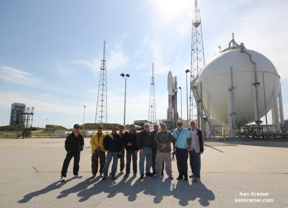 Space journalists and photographers pose at Launch Pad 41 during camera setup with the Atlas V rocket slated to loft super secret NROL-67 spy satellite to orbit. Ken Kremer/Universe Today at right. Credit: Ken Kremer - kenkremer.com
