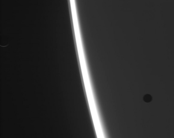 Raw image of Saturn with two moons acquired by Cassini on March 11, 2014 (NASA/JPL-Caltech/SSI)