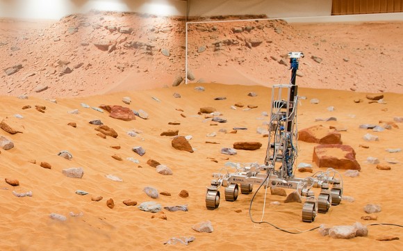 A Martian rover prototype nicknamed "Bryan" inside a newly upgraded "Mars Yard" in Stevenage, United Kingdom. The European Space Agency announced the improvements as it works on the ExoMars rover, which is slated to land on the Red Planet in 2018. Credit: Airbus Defence and Space