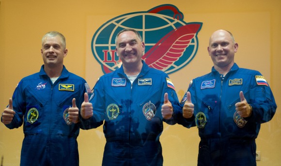 The Expedition 39/40 crew gives a thumbs-up during quarantine prior to their March 25, 2014 launch from Kazakhstan. From left: Steve Swanson (NASA), Alexander Skvortsov (Roscosmos) and Oleg Artemyev (Roscosmos). Credit: NASA